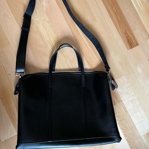 Danier leather briefcase laptop business bag. Black, elegant, classic